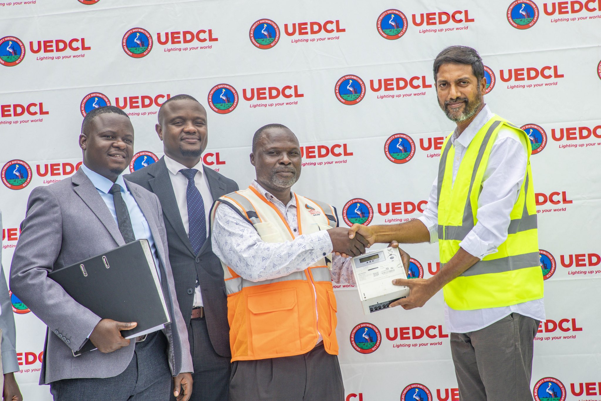Left to right: UEDCL North-West Territory Manager Deusdedit Magezi, representative of the UEDCL Managing Director Alex Atukunda, representative of UEDCL’s Chief of Technical Services Eng. Fred Wamala and representative of Hydromax’s MD Mr. Basker at the handover ceremony of distribution operations from Hydromax to the Uganda Electricity Distribution Company Limited (UEDCL) in Hoima.