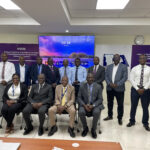 UEDCL Managing Director Paul Mwesigwa (second-left in front row) and PPDA Executive Directive Benson Turamye (second-right in front row) and other UEDCL and PPDA staff members at the opening of the Public Procurement Best Practice Capacity Building on Monday, July 28, 2025 at PPDA Head Office Nakasero