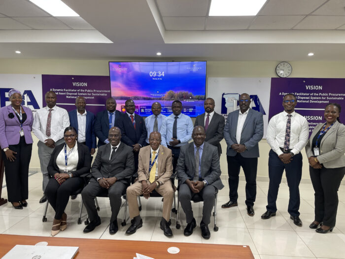 UEDCL Managing Director Paul Mwesigwa (second-left in front row) and PPDA Executive Directive Benson Turamye (second-right in front row) and other UEDCL and PPDA staff members at the opening of the Public Procurement Best Practice Capacity Building on Monday, July 28, 2025 at PPDA Head Office Nakasero